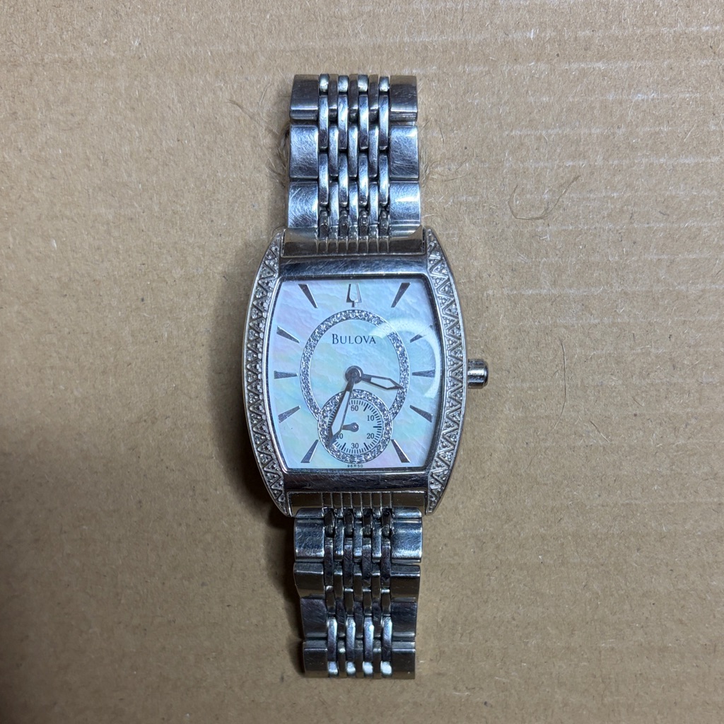 Bulova Silver Timepiece With Crystal Details Bulova Silver Timepiece With Crystal Details